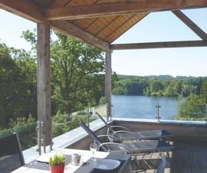 Luxury holiday apartment with a sauna, fireplace and views over a lake Robertville Belgium