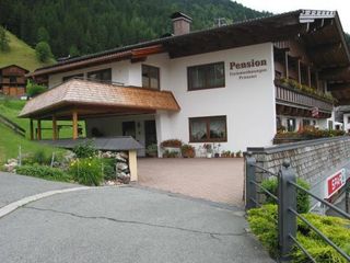 Фото отеля Ferienwohnungen Pension Prünster