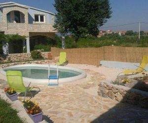 Apartments with a swimming pool Podgradina (Novigrad) - 6198 Posedarje Croatia