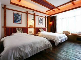 Фото отеля Zhangjiajie Highlights Guesthouse