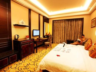 Фото отеля Zhangjiajie Qinghe Jinjiang International Hotel