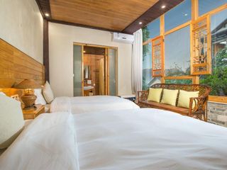 Фото отеля Heshun Xinyue Boutique Inn