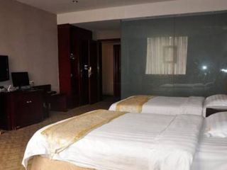 Фото отеля Nanjiang Yukun Business Hotel