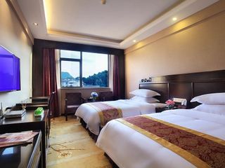 Фото отеля Shengshi Hotel