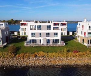 Doppelhaushälfte Lootsen Hus mit Hafenblick Olpenitz Germany