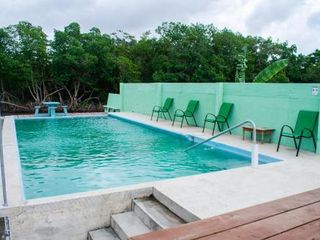 Фото отеля See Belize SUNROOM Sea View Suite with access to Infinity Pool & Panor