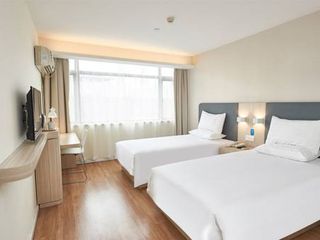 Фото отеля Hanting Hotel Zhengzhou East Haihang Road