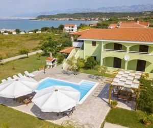 Seaside apartments with a swimming pool Ljubac (Zadar) - 11922 Razanac Croatia