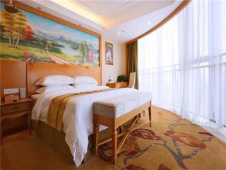 Фото отеля Vienna International Hotel Yantai Changjiang Road Xingyi Square Branch