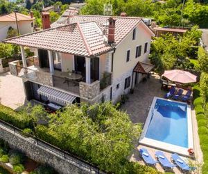 Apartments with a swimming pool Lovran (Opatija) - 14196 Opric Croatia