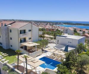 Family friendly apartments with a swimming pool Novalja (Pag) - 14275 Novaglia Croatia