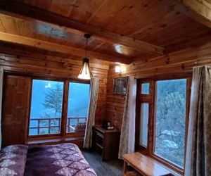 Ishan log huts Banjar India