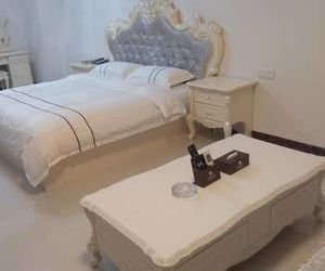 Lvxing Theme Apartment (Zhuhai Chengfeng Shuijingzuo) Zhuhai China