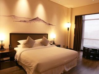 Фото отеля Amitabha Hotel (Fuzhou Pushang)