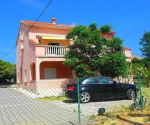 Apartments with a parking space Barbat (Rab) - 15459 Rab Croatia