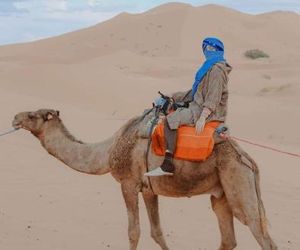 Desert camel trek Merzouga Morocco