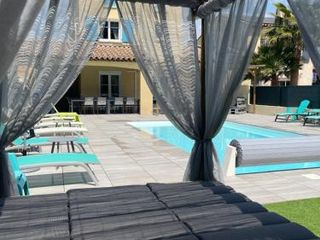 Фото отеля Maison 8-10 pers avec piscine aux portes de St Aygulf