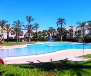 Piso con jardin y piscinas en Puerto Rey Vera Playa Spain