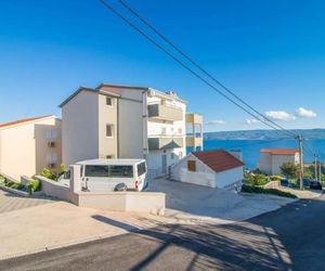 Apartments with a swimming pool Mali Rat (Omis) - 9698 Dugi Rat Croatia