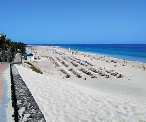 Apartment on the seafront, overlooking the beach, swimming pools, equipped. Wifi Morro del Jable Spain