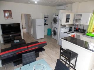 Hotel pic Stewart Apt-Trincity,Airport,Washer,Dryer,Office,Cable ,WiFi,Alarm,Gat