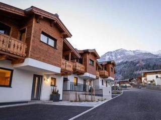 Фото отеля First IN Mountain Chalets by we rent