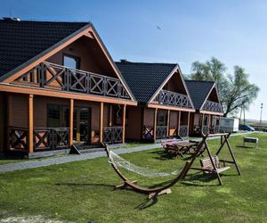 Lovely house overlooking the lake, only 1000m from the sea. Ideal for 9 people. Mielno Poland