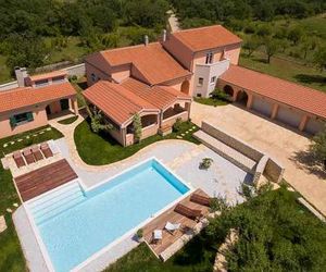 Nice home in Prkos w/ Outdoor swimming pool, Sauna and 5 Bedrooms Galovac Croatia