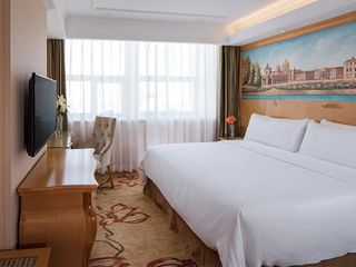 Фото отеля Vienna Hotel(Shenzhen Shajing Jingjinbaina Branch)