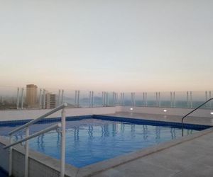 Apartamento Praia Grande Mirim frente ao mar, churrasqueira na varanda e piscina na cobertura Praia Grande Brazil