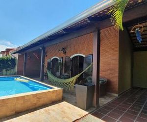 Casa 4, com piscina, 3dorm, 4vgs, 200mts praia Itanhaen Brazil