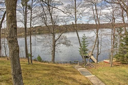 Photo of Cozy Balsam Lake Home Deck, Private Dock and Kayaks