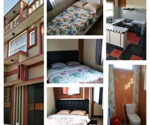 Bening Homestay bersih murah 4 kamar 3 kamar mandi Batu Indonesia