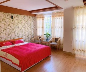 VanCao Green Homestay - room with balcony Haiphong Vietnam