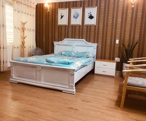 Vancao Green homestay - Deluxe room with queen bed Haiphong Vietnam