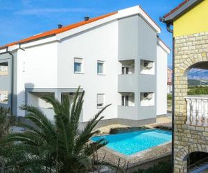 Family friendly apartments with a swimming pool Novalja (Pag) - 17228 Novaglia Croatia