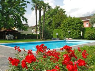 Фото отеля Ferienwohnung mit Garten und Pool in Ascona