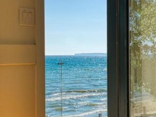 Фото отеля TheLongBeachResort - Beachfront Cottages & Townhouse Suites