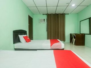Фото отеля OYO 90124 Payang Puri Baru Hotel