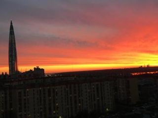 Red apartment with the view of the Lakhta Center Tower