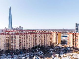Red apartment with the view of the Lakhta Center Tower