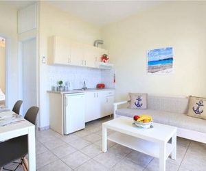 Swim, sunbathe, relax in beach front apt Daphne Kato Gouves Greece