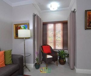 Choose To Be Happy at Ravinia - One Bedroom Apartment Kingston Jamaica