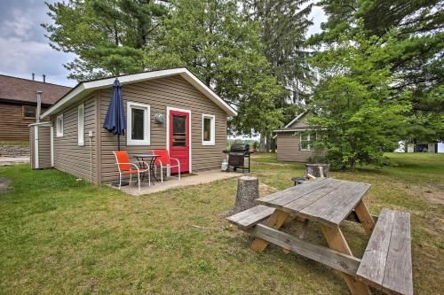 Photo of Cozy Suttons Bay Cottage with Shared Dock and Fire Pit!