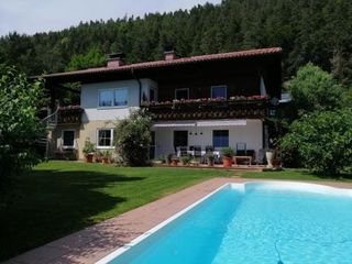 Фото отеля Ferienwohnung mit Pool in Wörthersee Nähe