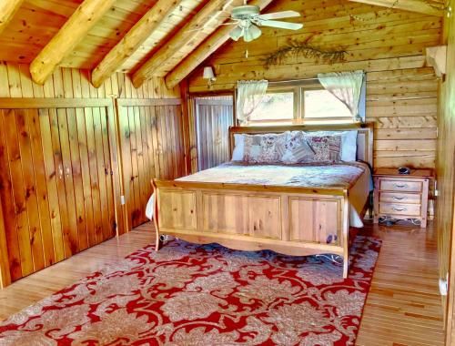 Photo of SI INCREDIBLE VIEWS from this log cabin with large deck, huge yard, fire pit, hot tub!