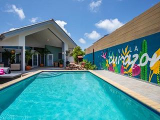 Фото отеля Villa Curazon met privézwembad vlakbij het strand!