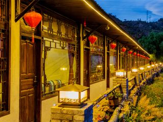 Фото отеля Lijiang Taoyuan Inn