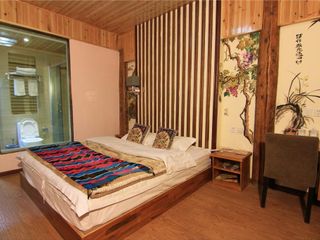 Фото отеля Lijiang Rongyi Homestay