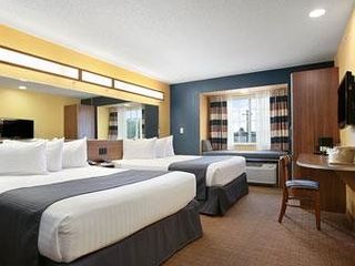 Фото отеля Microtel Inn & Suites Chili/Rochester